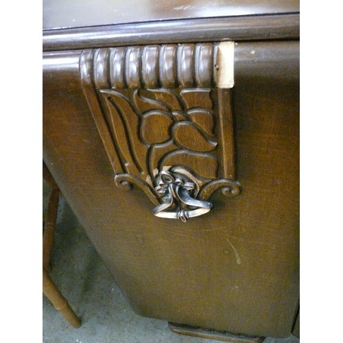 410 - LARGE VINTAGE SOLID BOW FRONTED SIDEBOARD, 4 CENTRAL DRAWERS, 2 CUPBOARDS AND HEAVY CARVED DETAIL