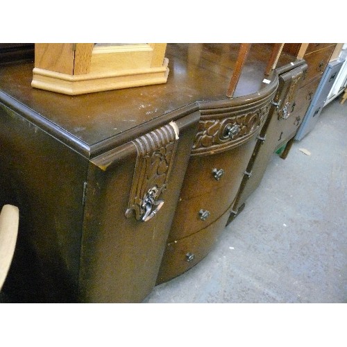 410 - LARGE VINTAGE SOLID BOW FRONTED SIDEBOARD, 4 CENTRAL DRAWERS, 2 CUPBOARDS AND HEAVY CARVED DETAIL