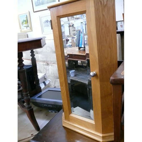 411 - LIGHT OAK CORNER WALL CABINET WITH BEVEL EDGE MIRRORED DOOR