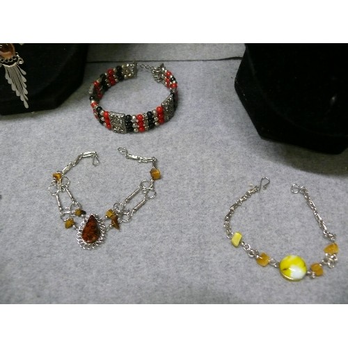 62 - A NICE COLLECTION OF PERUVIAN AND ETHNIC WIREWORK COSTUME JEWELLERY WITH SEMI PRECIOUS STONES TO INC... 