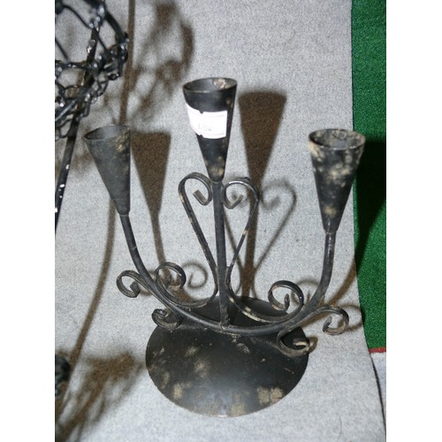 125 - A BLACK METAL WALL HANGING BASKET WITH CHICKEN MOTIF AND A CANDLEHOLDER