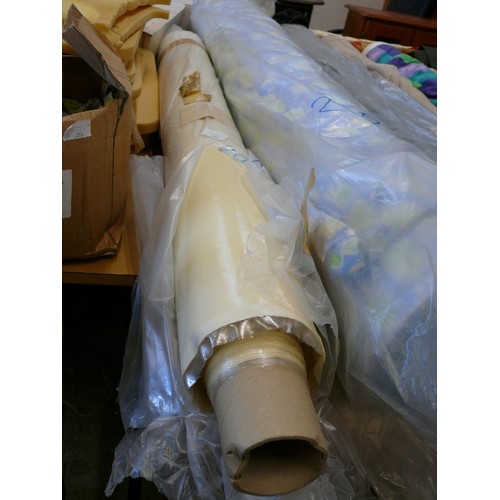 204 - A NEW ROLL OF CREAM VINYL FABRIC