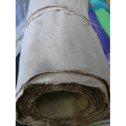 207 - A LARGE ROLL OF HESSIAN STYLE FABRIC