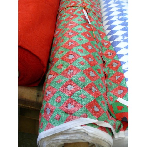 212 - A LARGE ROLL OF RED AND GREEN PLAYING CARD FABRIC