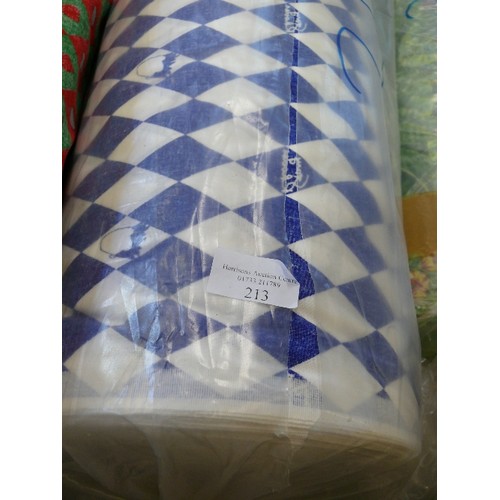 213 - A LARGE ROLL OF BLUE AND WHITE DIAMOND FABRIC FEATURING GARY RHODES