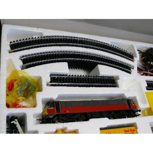 79 - A HORNBY RAILWAY RED STAR COURIER ELECTRIC TRAIN SET