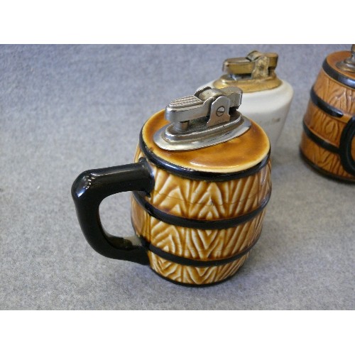 131 - 4 CERAMIC TANKARD STYLE TABLE LIGHTERS