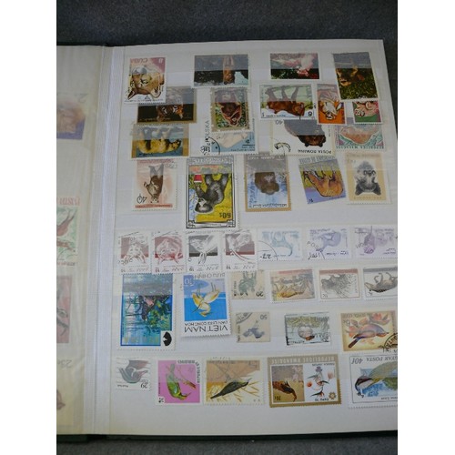 134 - A COLLECTION OF 6 FULL WORLD STAMP ALBUMS WITH A LARGE QUANTITY OF STAMPS