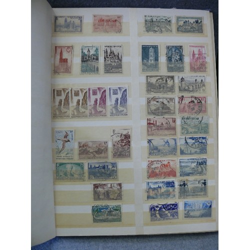 134 - A COLLECTION OF 6 FULL WORLD STAMP ALBUMS WITH A LARGE QUANTITY OF STAMPS