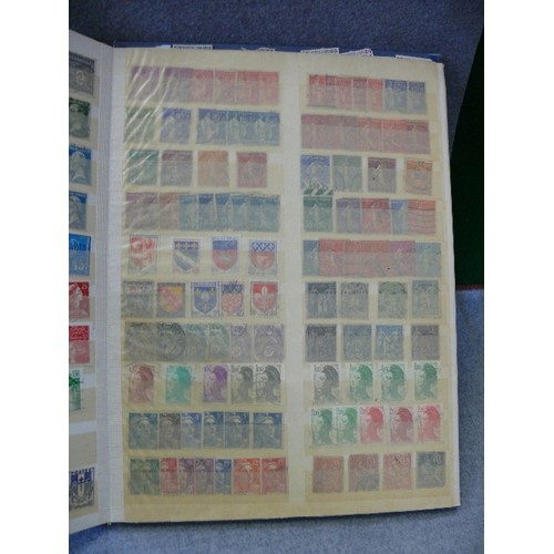 134 - A COLLECTION OF 6 FULL WORLD STAMP ALBUMS WITH A LARGE QUANTITY OF STAMPS