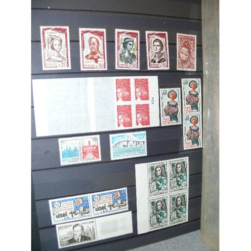 134 - A COLLECTION OF 6 FULL WORLD STAMP ALBUMS WITH A LARGE QUANTITY OF STAMPS