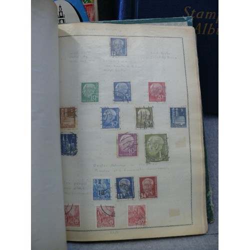 137 - A COLLECTION OF 3 WORLD STAMP ALBUMS WITH CONTENTS OF INTERESTING AND OLD STAMPS