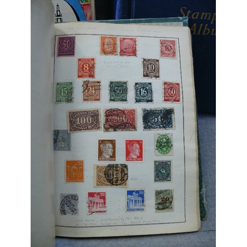 137 - A COLLECTION OF 3 WORLD STAMP ALBUMS WITH CONTENTS OF INTERESTING AND OLD STAMPS