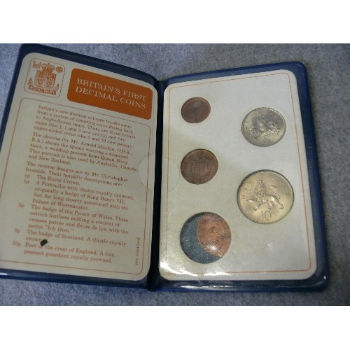 136 - A WICKER PICNIC BASKET AND A COIN SET OF BRITAINS FIRST DECIMAL COINS