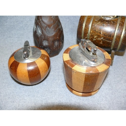 144 - 4 GOOD QUALITY CARVED WOODEN TABLE LIGHTERS