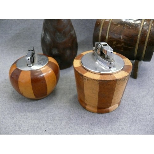 144 - 4 GOOD QUALITY CARVED WOODEN TABLE LIGHTERS