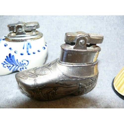 145 - 3 CERAMIC TABLE LIGHTERS AND A DECORATIVE PEWTER TABLE LIGHTER