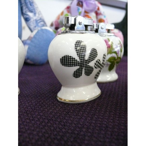 148 - 6 DECORATIVE CERAMIC TABLE LIGHTERS