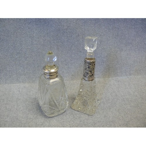 47 - TWO SILVER TOPPED CUT GLASS SCENT BOTTLES FOR DRESSING TABLE