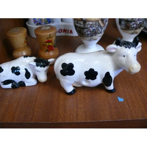 295 - 4 CRUET SETS - COWS, URNS, CORKS AND A TOURIST SET