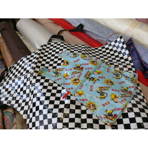 349H - QUANTITY OF VINYL APRONS - ADULTS AND CHILDREN - PARROT THEMED, FIREMAN, CHICKENS AND PLAIN BLACK ET... 