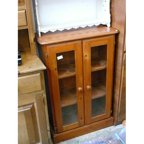 406 - NARROW PINE CUPBOARD WITH GLASS DOOR FRONTS