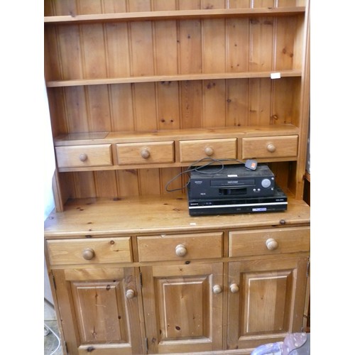 407 - LARGE PINE COUNTRY DRESSER (2 PIECES) 3 CUPBOARDS BENEATH A SHELVED TOP WITH 4 SMALL CENTRAL DRAWERS