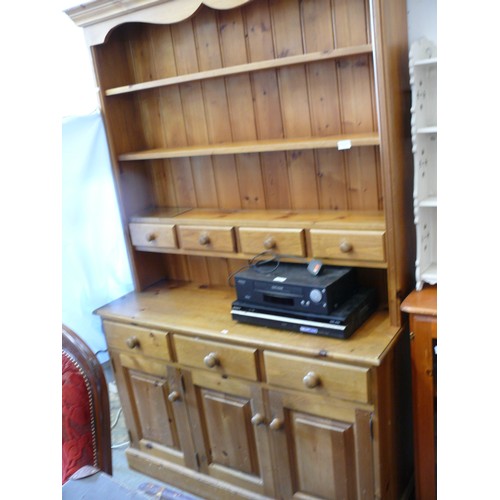 407 - LARGE PINE COUNTRY DRESSER (2 PIECES) 3 CUPBOARDS BENEATH A SHELVED TOP WITH 4 SMALL CENTRAL DRAWERS