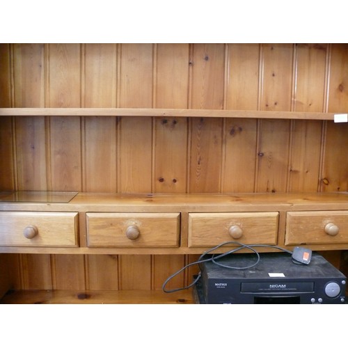 407 - LARGE PINE COUNTRY DRESSER (2 PIECES) 3 CUPBOARDS BENEATH A SHELVED TOP WITH 4 SMALL CENTRAL DRAWERS