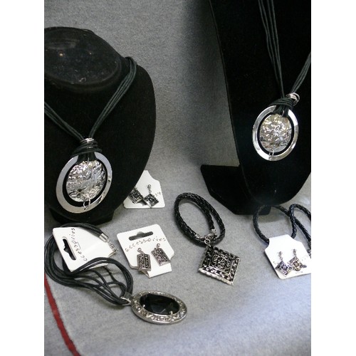 54 - A COLLECTION OF NEW CHROME AND LEATHER COSTUME JEWELLERY NECKLACES AND EARRINGS