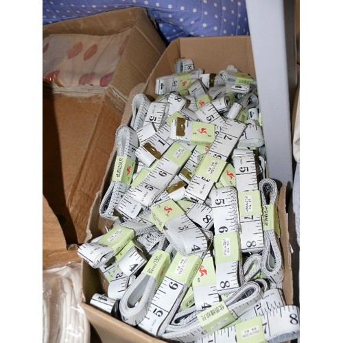 179 - A BOX CONTAINING OVER 100 BRAND NEW WHITE TAPE MEASURES