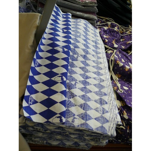 182 - A VERY LARGE QUANTITY OF BLUE AND WHITE DIAMOND FABRIC OFFCUTS FEATURING GARY RHODES