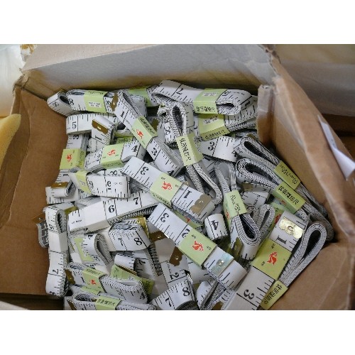 203 - A LARGE BOX OF TAPE MEASURES