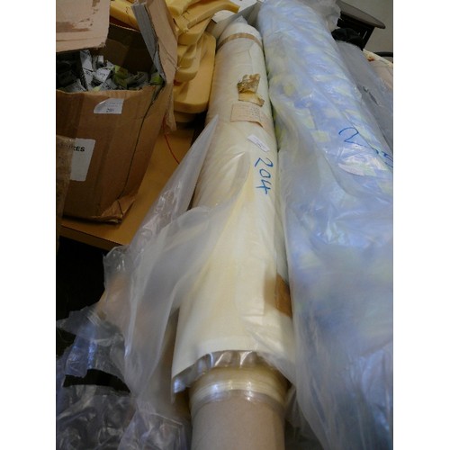 204 - A NEW ROLL OF CREAM VINYL FABRIC