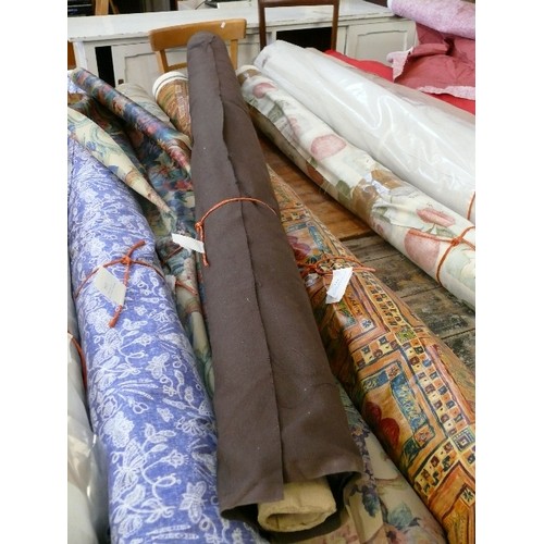 237 - A LARGE ROLL OF GOOD QUALITY BROWN FABRIC