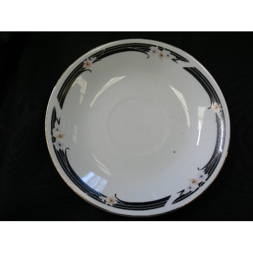 294 - FINE CHINA TEASET IN WHITE WITH  PATTERN AROUND THE EDGING BLACK WITH PASTEL FLOWERS