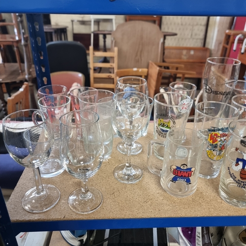 345B - SHELF OF PINT GLASSES MOSTLY WITH ADVERTISING