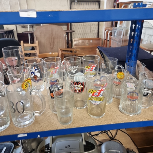 345B - SHELF OF PINT GLASSES MOSTLY WITH ADVERTISING