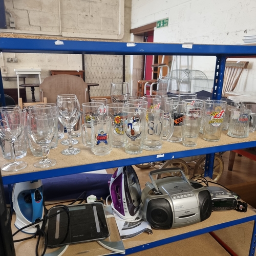 345B - SHELF OF PINT GLASSES MOSTLY WITH ADVERTISING