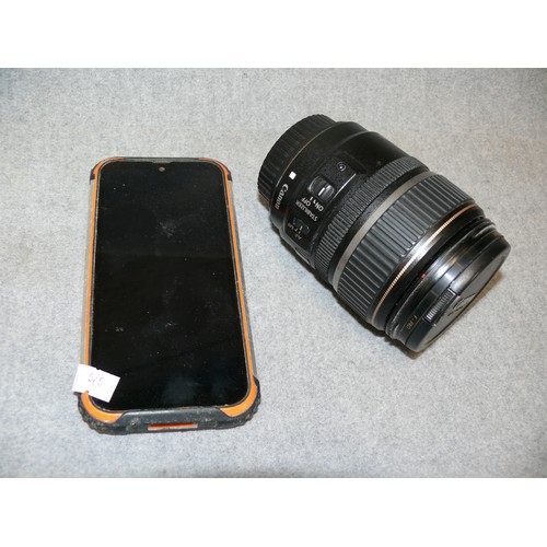 69 - AN ANDROID SMART PHONE PLUS A CANON CAMERA LENS