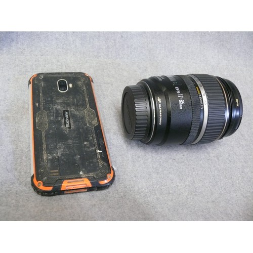 69 - AN ANDROID SMART PHONE PLUS A CANON CAMERA LENS