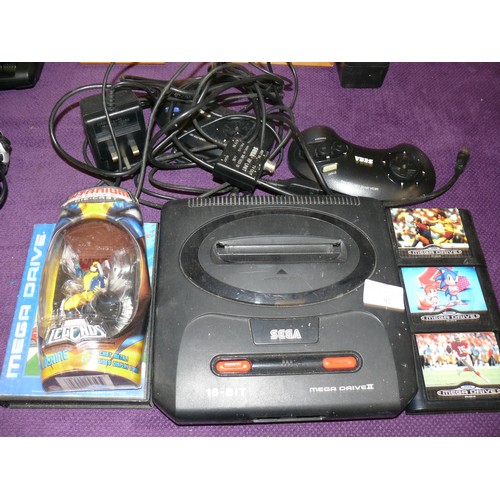 92 - A SEGA MEGA DRIVE 16BIT WITH CONTROLLERS AND VARIOUS GAMES TO INCLUDE STREET RACER AND SONIC PLUS A ... 