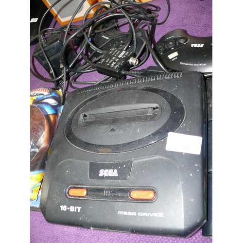 92 - A SEGA MEGA DRIVE 16BIT WITH CONTROLLERS AND VARIOUS GAMES TO INCLUDE STREET RACER AND SONIC PLUS A ... 