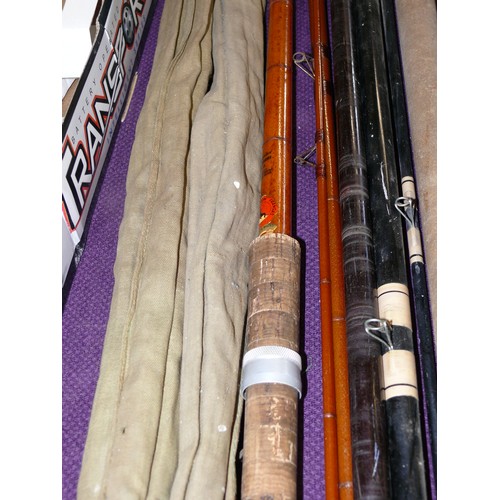 97 - 2 VINTAGE FISHING RODS 1 WITH BAG PLUS A FIBREGLASS FISHING POLE