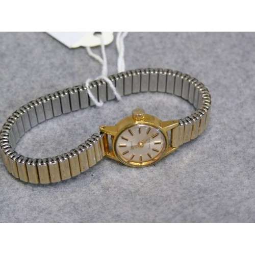 12 - A TISSOT GOLD WATCH 1960`s, HAND WIND WORKING