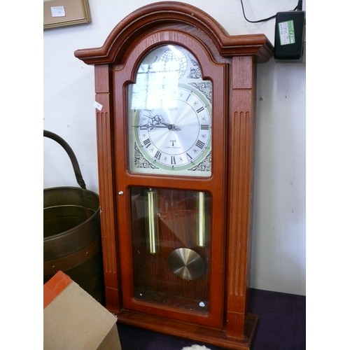 98 - A WOODEN CASED ACCTIM RADIO CONTROLLED WALL CLOCK