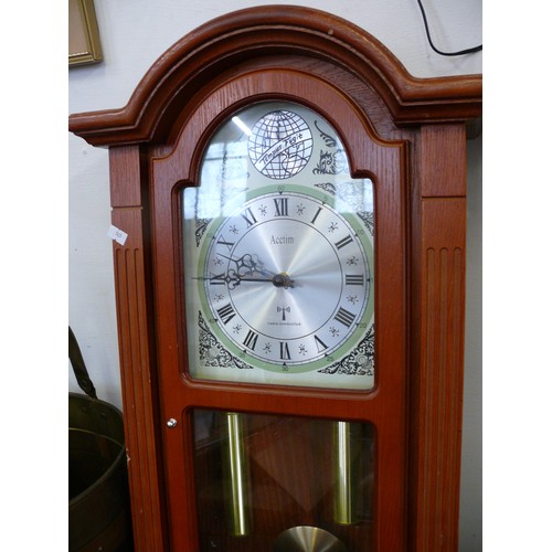 98 - A WOODEN CASED ACCTIM RADIO CONTROLLED WALL CLOCK