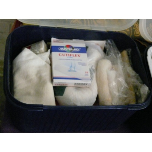 157 - 2 PLASTIC STORAGE TUBS, I WITH A LARGE QUANTITY OF FIRST AID THE OTHER WITH SOME CRAFT ITEMS