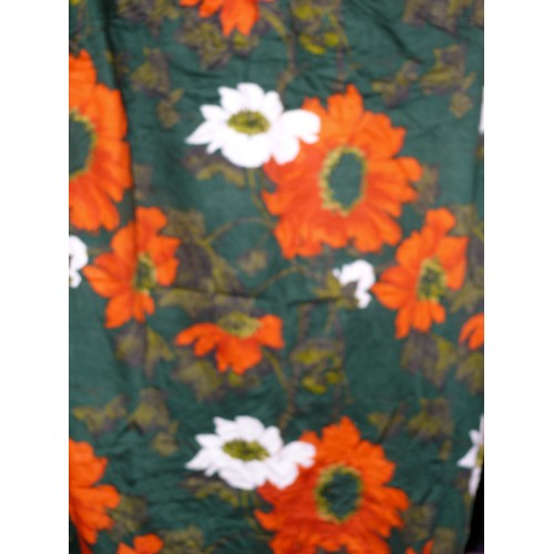 155 - A PAIR OF VINTAGE RETRO GREEN AND ORANGE FLORAL CURTAINS