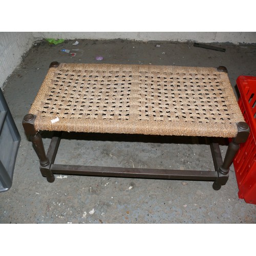 136 - A LARGE RATTAN TOPPED STOOL